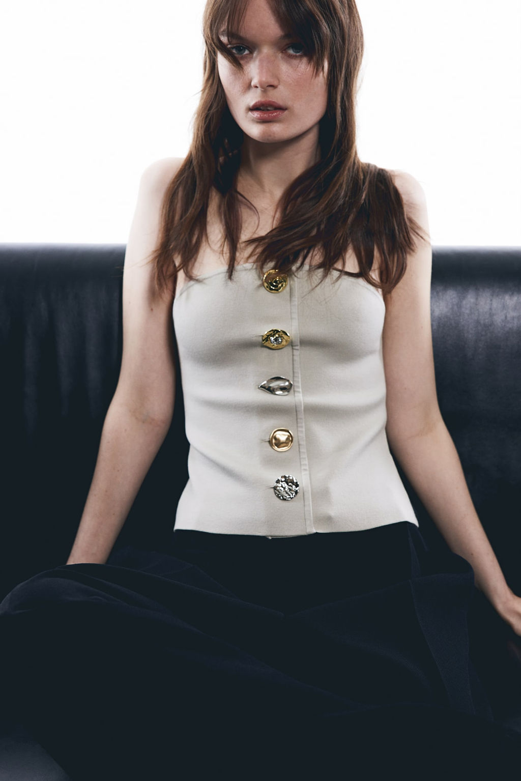 Top bandeau con botones decorativos