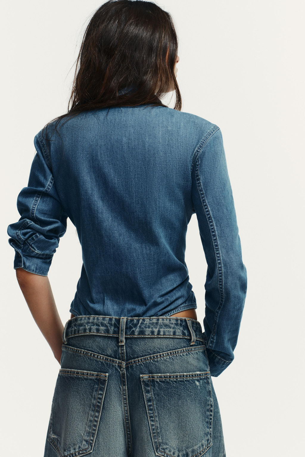 SHIRT-STYLE BODYSUIT WITH SHOULDER PADS