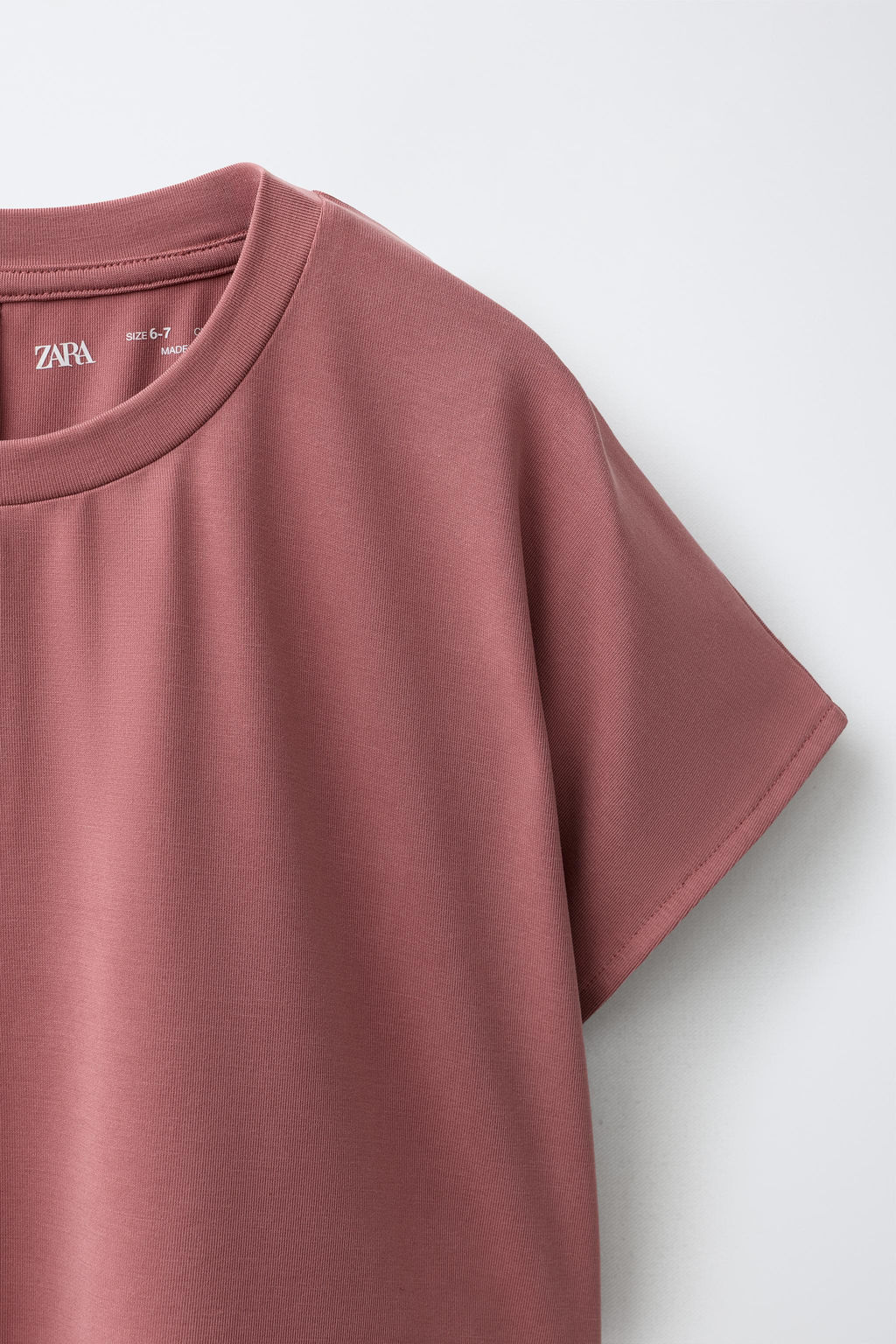 CAMISETA FLUIDA GYM CON MODAL / Rosa empolvado