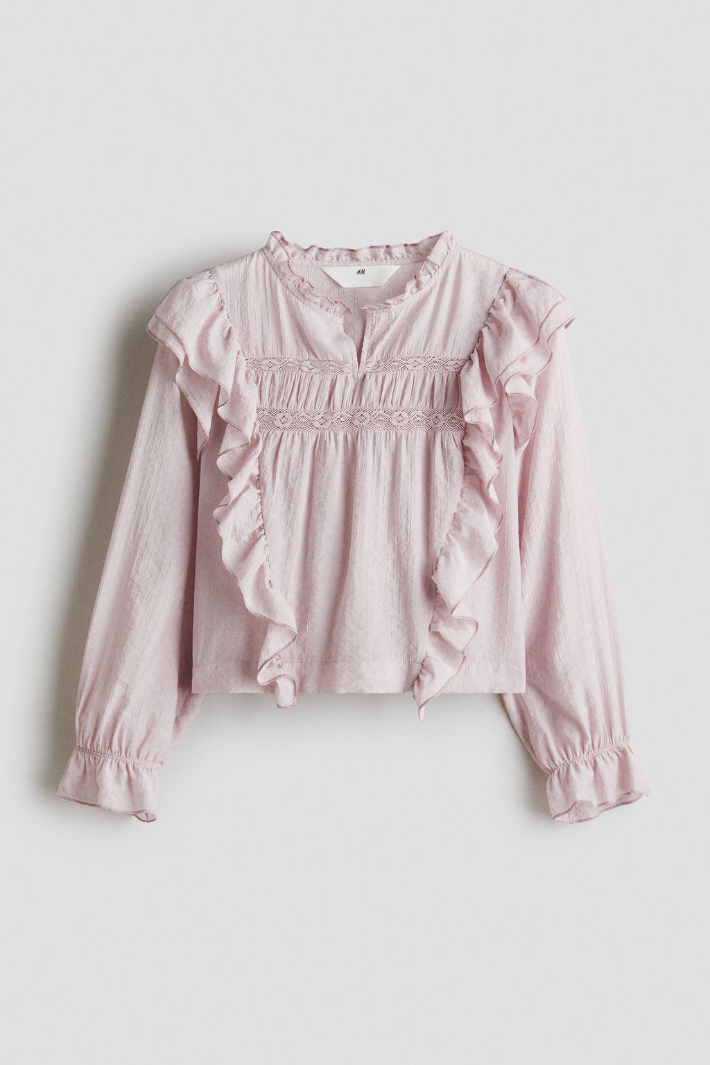 Blusa con ribetes de volante