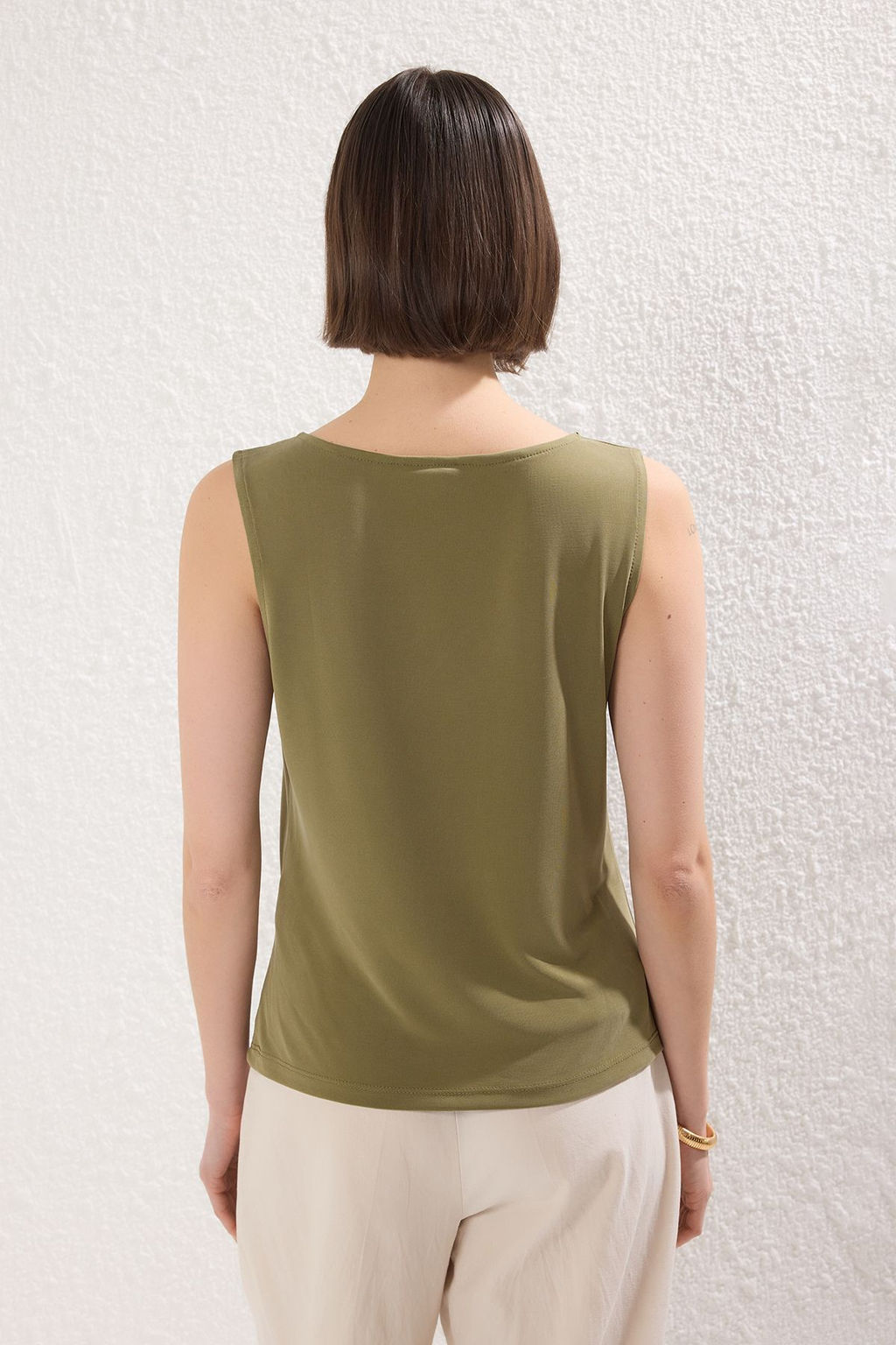Yesil More Sustainable Modal Icerikli Burgu Detayl? Asimetrik Yaka Regular Orme Bluz TWOSS25BZ00469