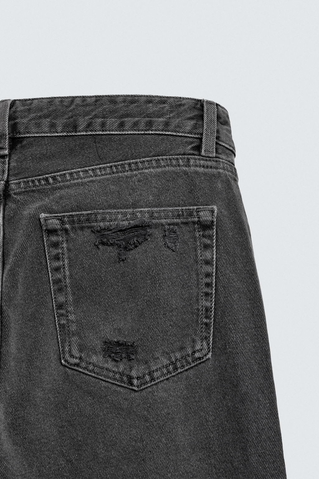 RIPPED BELL BOTTOM FIT JEANS