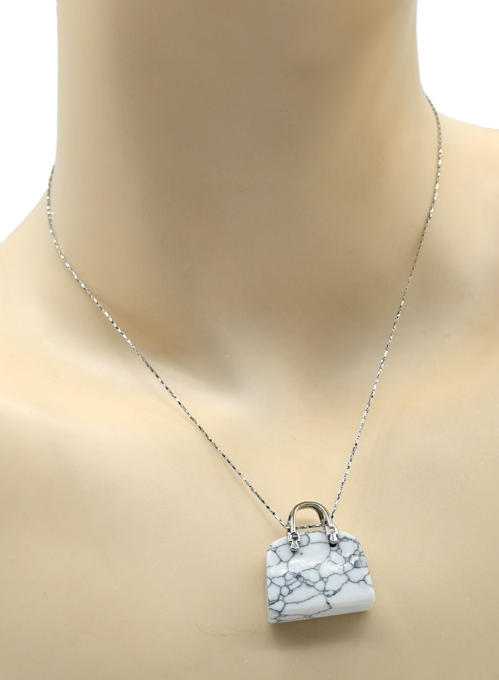 Оригинальная подвеска с кахолонгом искусственным в форме сумочки 25*10*27мм.