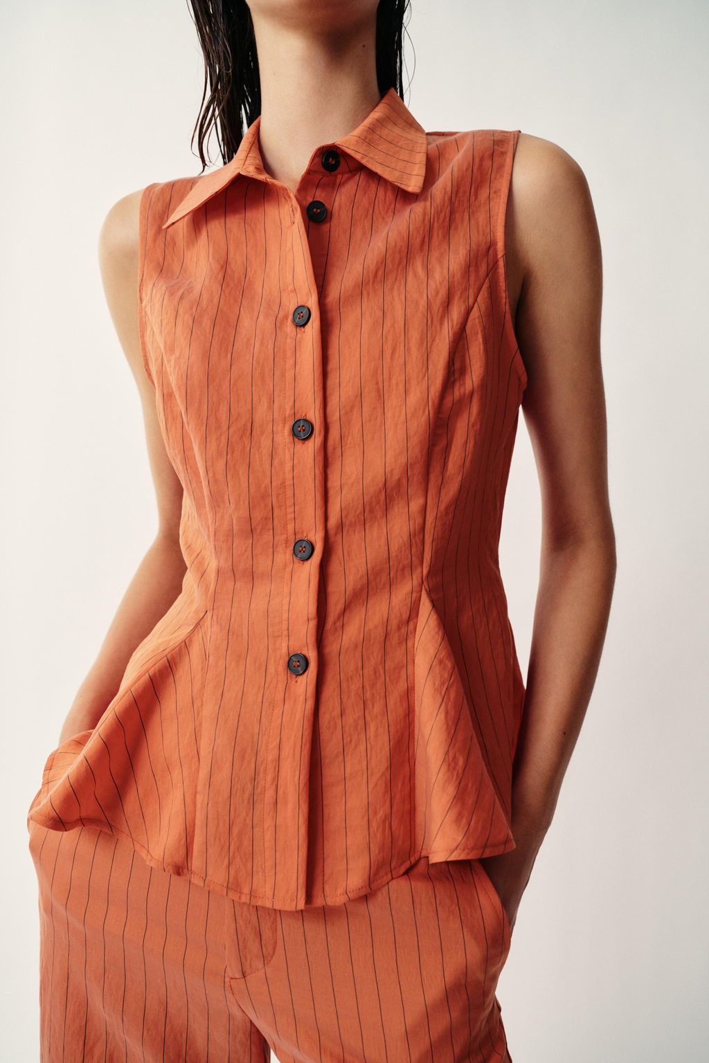 CHALECO RAYAS PEPLUM / Caldero