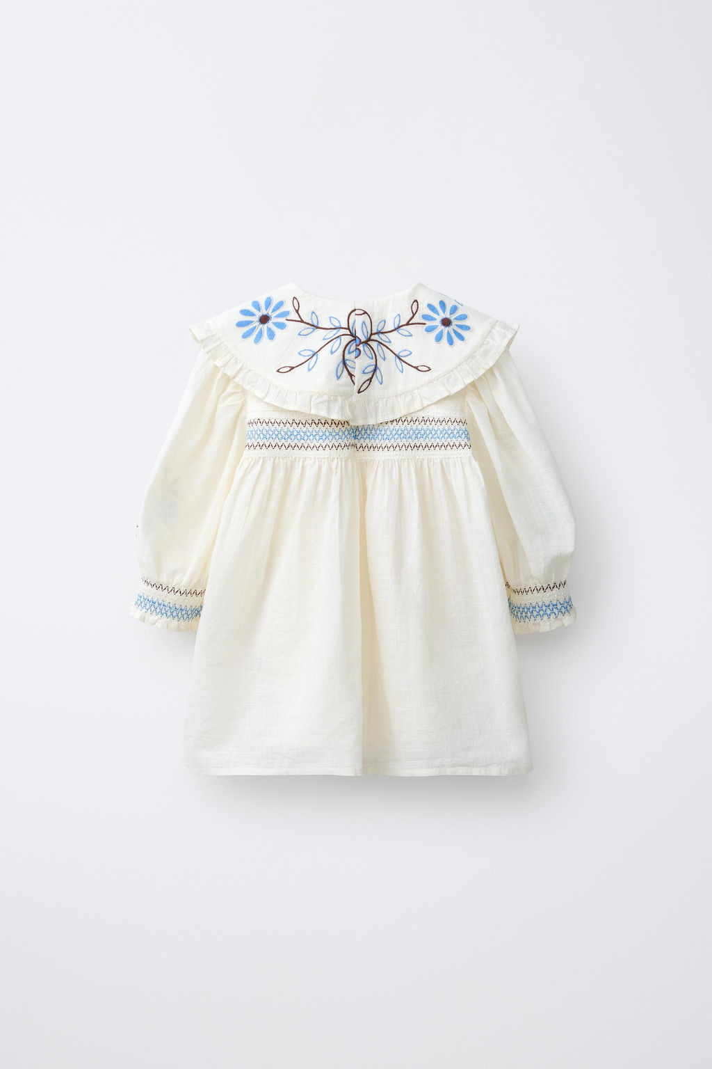 CAMISA CUELLO BOBO FLORES BORDADAS / Crudo