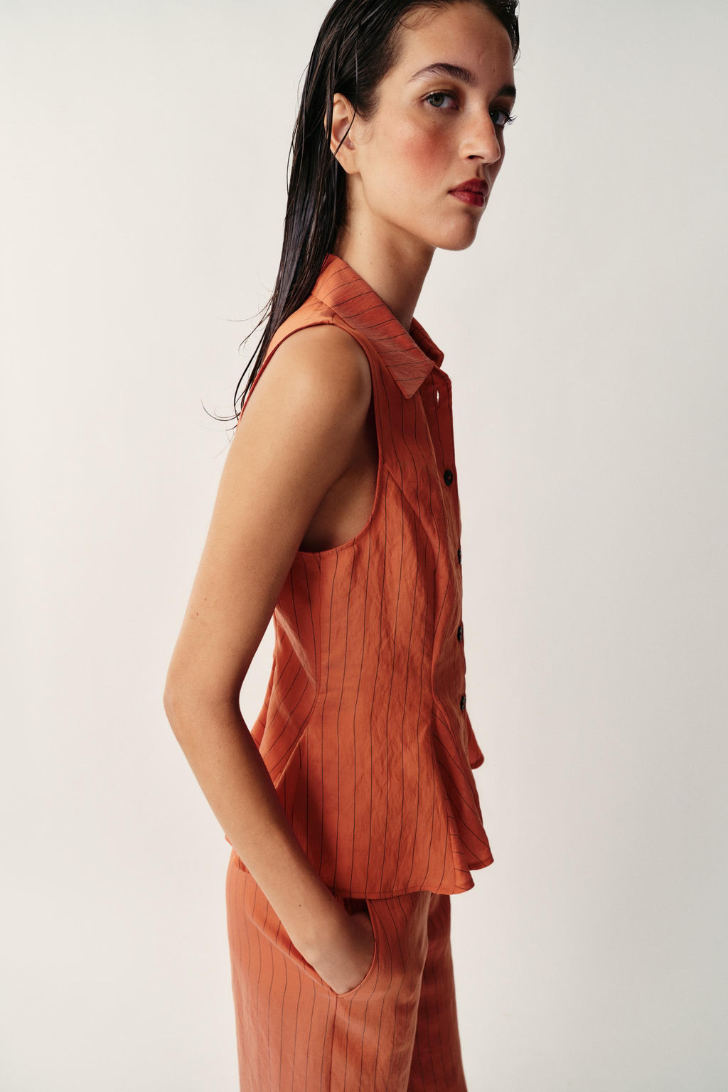 CHALECO RAYAS PEPLUM / Caldero