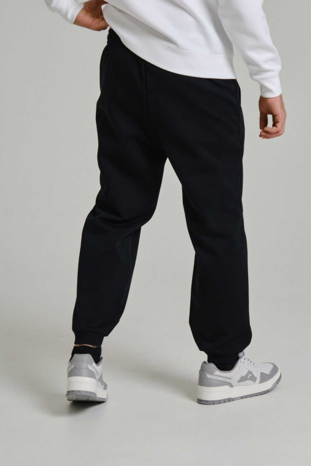 Брюки трикотажные утепленные Черный CAMPUS Knit Track Pants - Anta фото 6