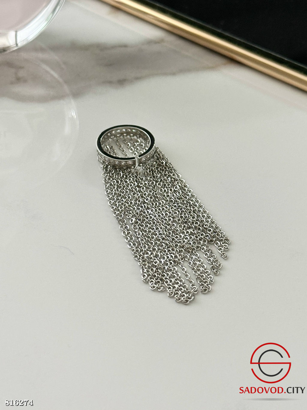 Кольцо с подвесными цепочками