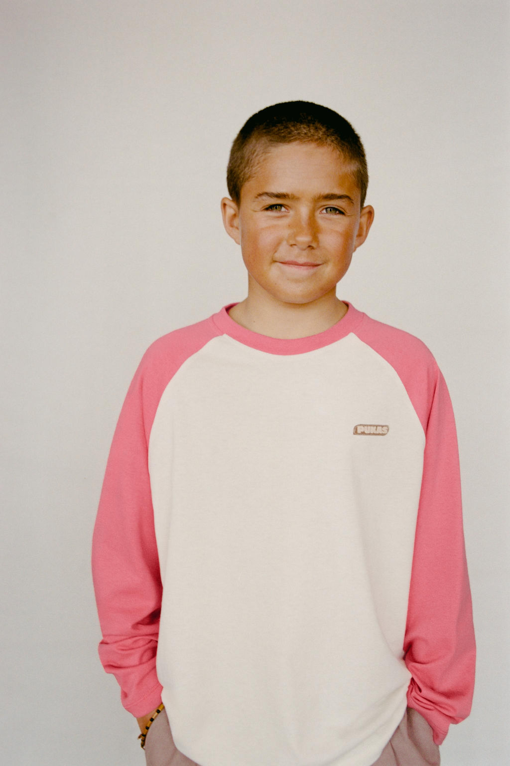 CAMISETA MANGA RANGL?N PUKAS SURF / Rosa / Blanco
