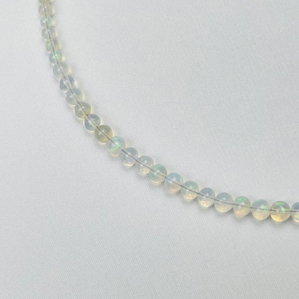 Колье на увеличение из Опала