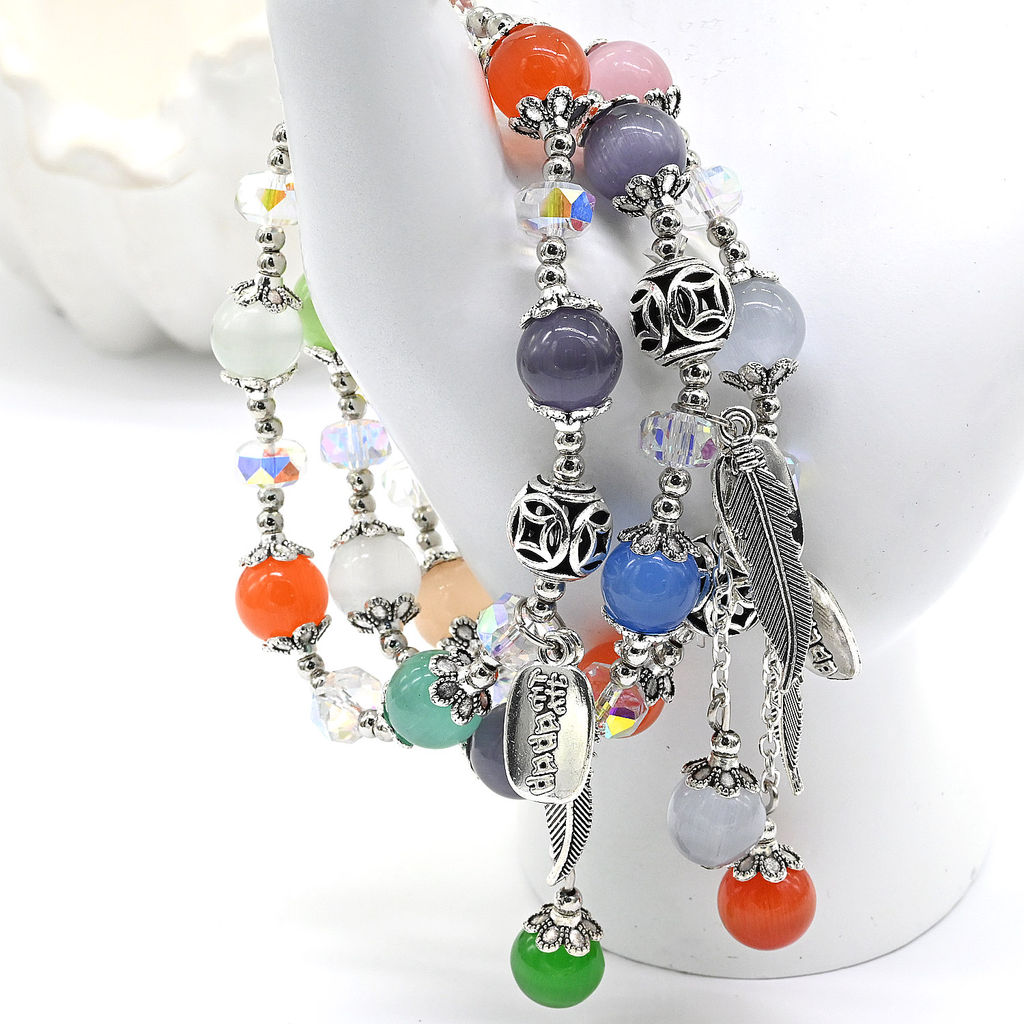 Браслет из кошачьего глаза шарик 10мм с подвесками цвет микс