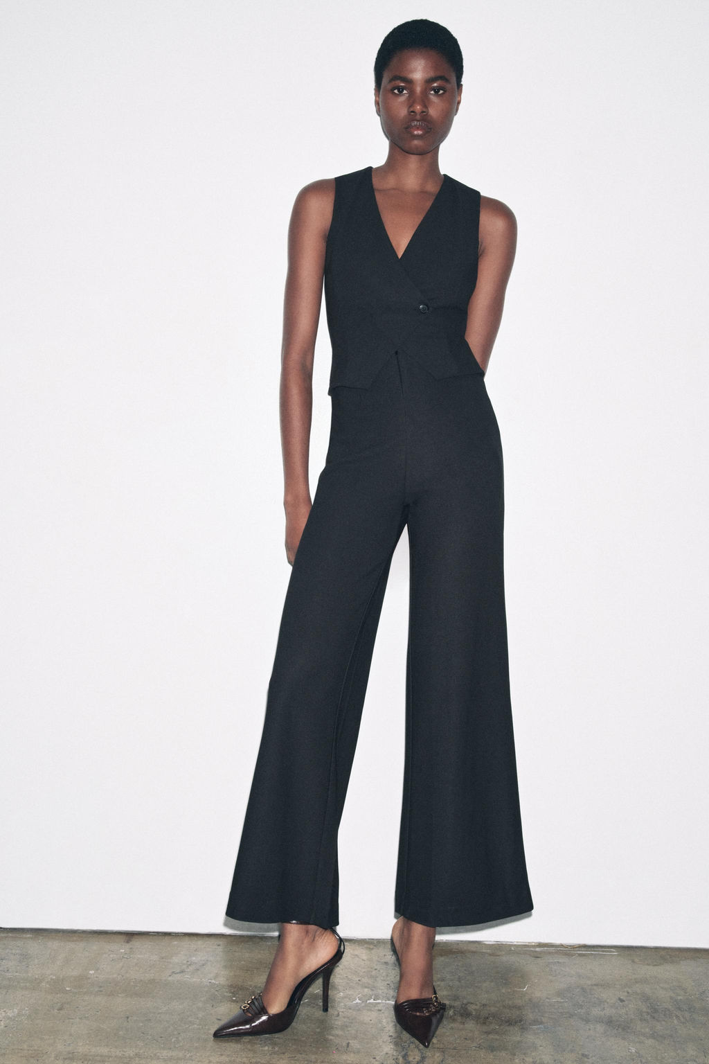 LONG CREPE JUMPSUIT WITH WAISTCOAT DETAIL