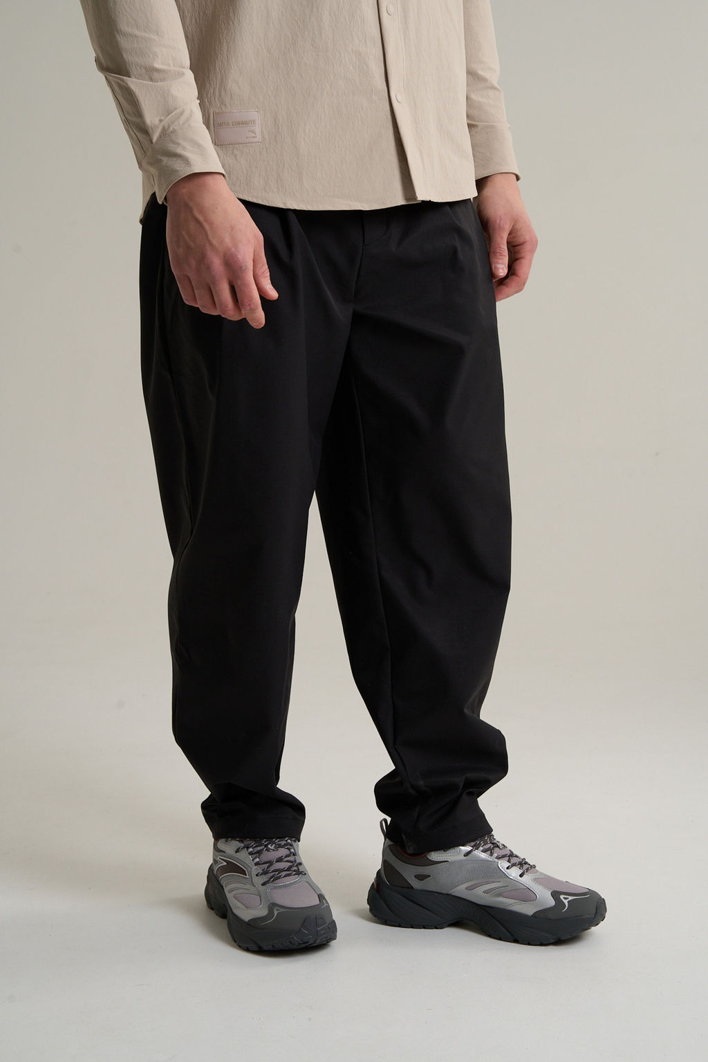 Брюки текстильные Черный COMMUTE Woven Track Pants - Anta фото 3