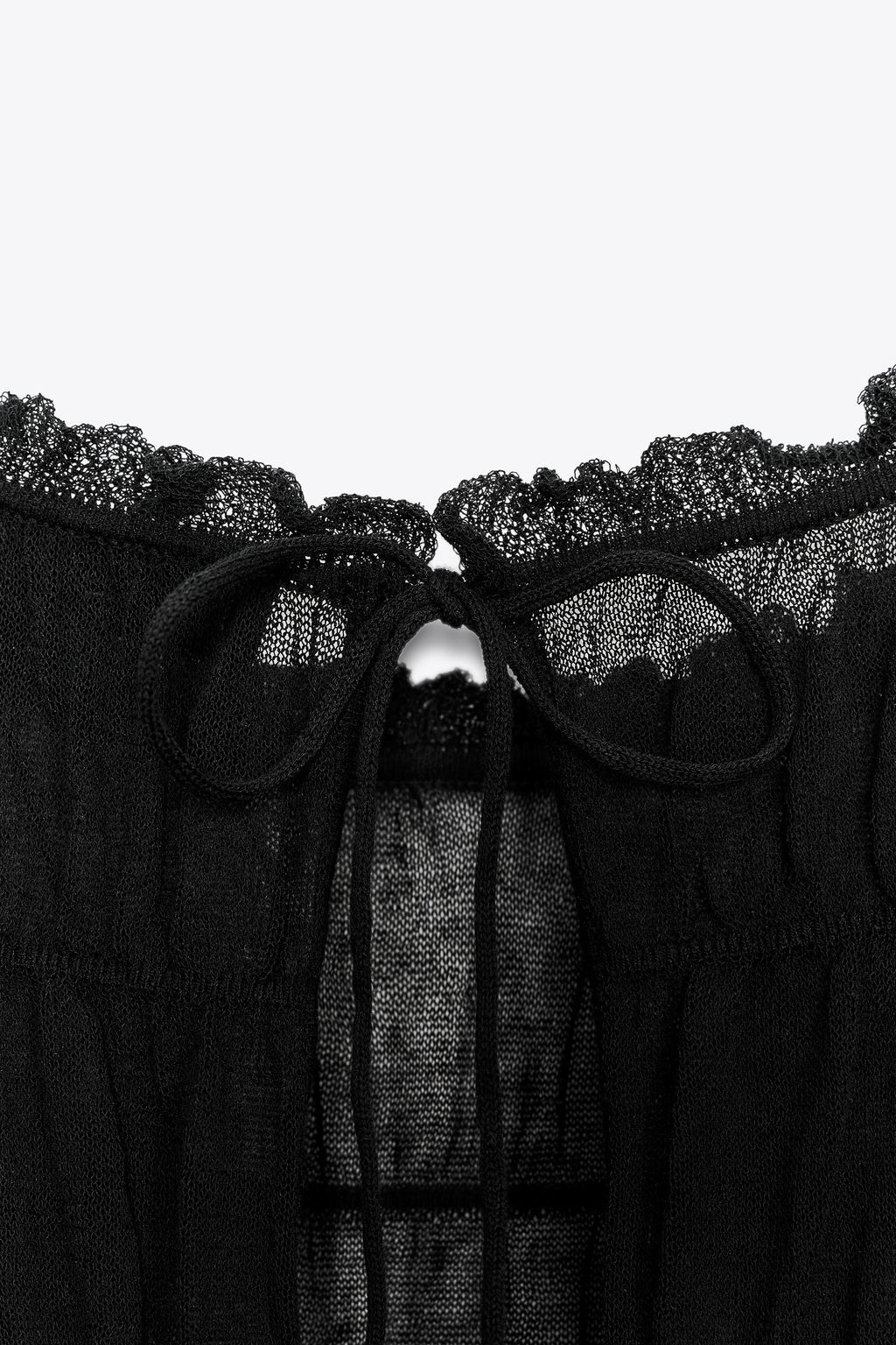 SEMI-SHEER KNIT BLOUSE WITH GATHERED DETAILS