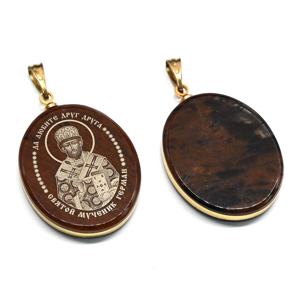 Кулон из обсидиана овал с окантовкой " Св. Герман " 20*30мм.