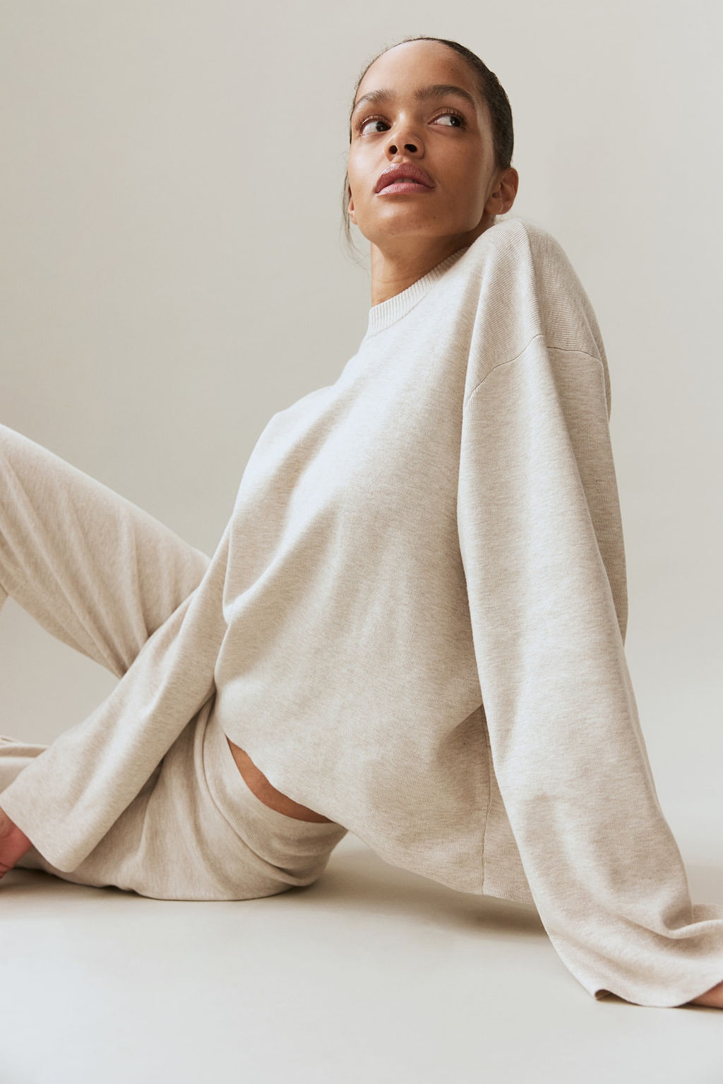 Jersey oversize con bajo redondeado