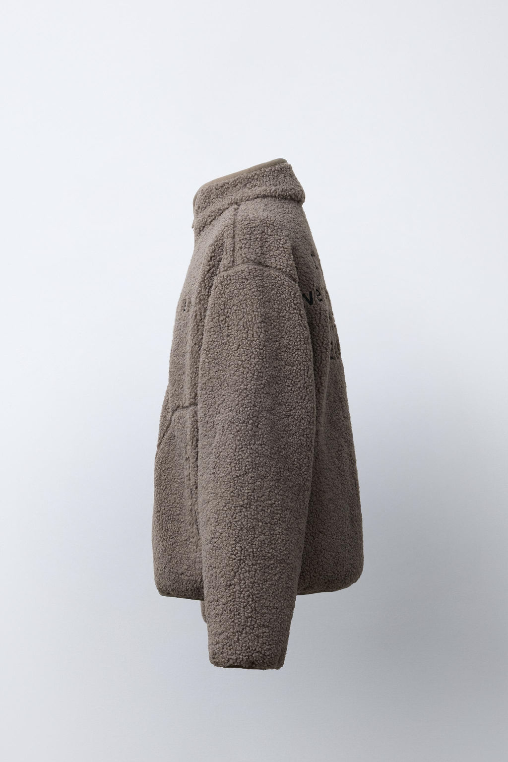 FAUX SHEARLING JACKET WITH EMBROIDERED TEXT