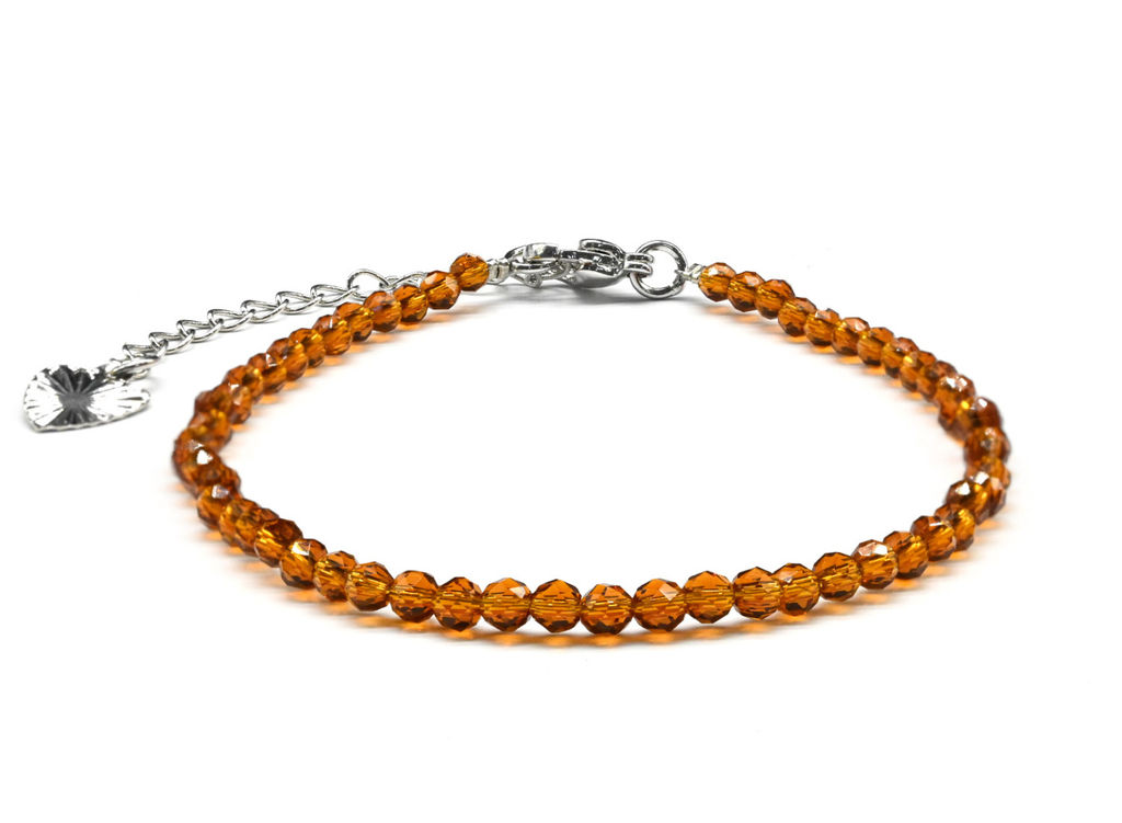 Браслет из циркона шарик гр.3мм цв.коньячный, 17см