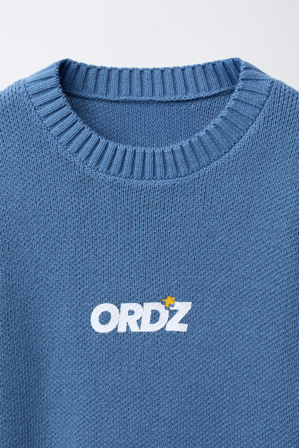 KNIT SWEATER WITH SLOGAN