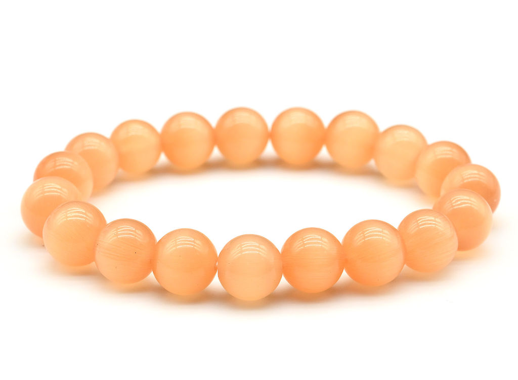 Браслет шарик 10мм из кошачьего глаза цв.персиковый, 15см