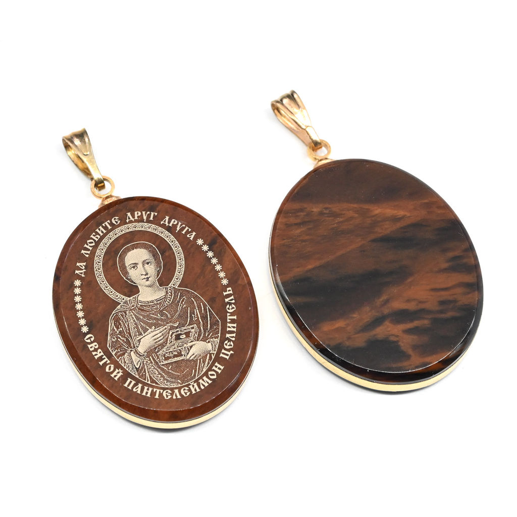 Кулон из обсидиана овал с окантовкой " Пантелеймон" 20*30мм.