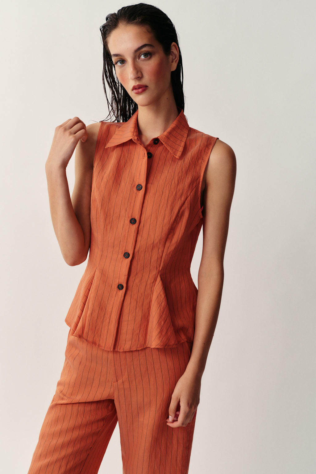 CHALECO RAYAS PEPLUM / Caldero