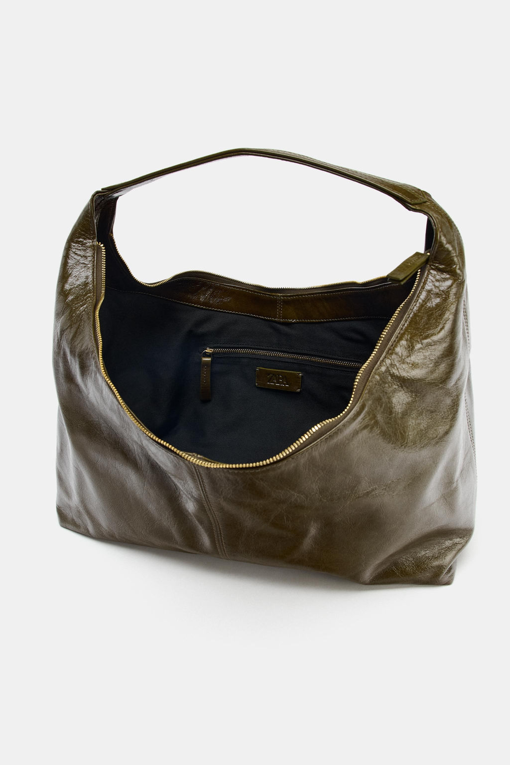 OVAL LEATHER HANDBAG
