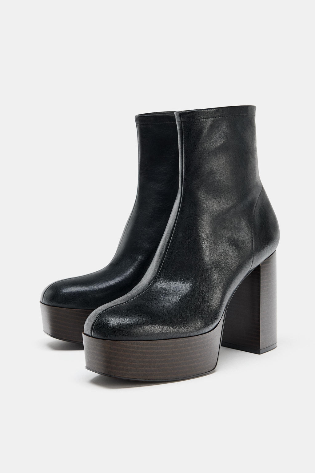 PLATFORM HEELED ANKLE BOOTS