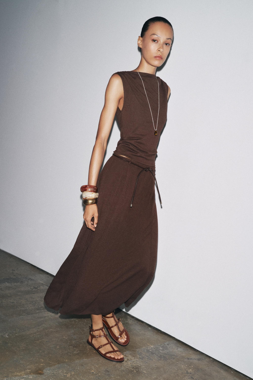 KNITTED CUT-OUT SKIRT WITH BELT