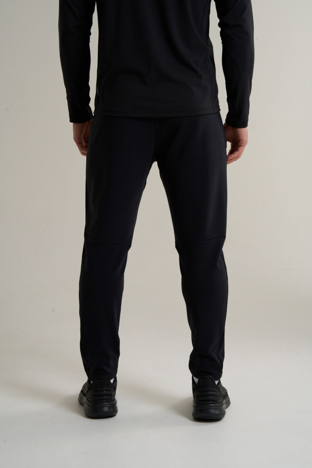 Брюки трикотажные утепленные Черный ANTA RUNNING Knit Track Pants фото 6