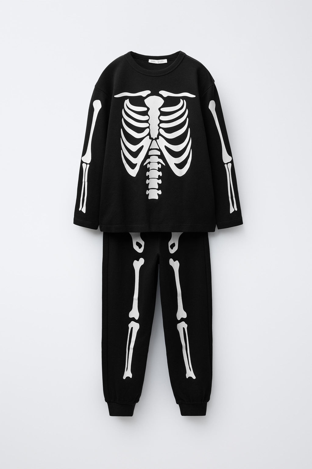 6-14 YEARS/ GLOW-IN-THE-DARK SKELETON PYJAMAS