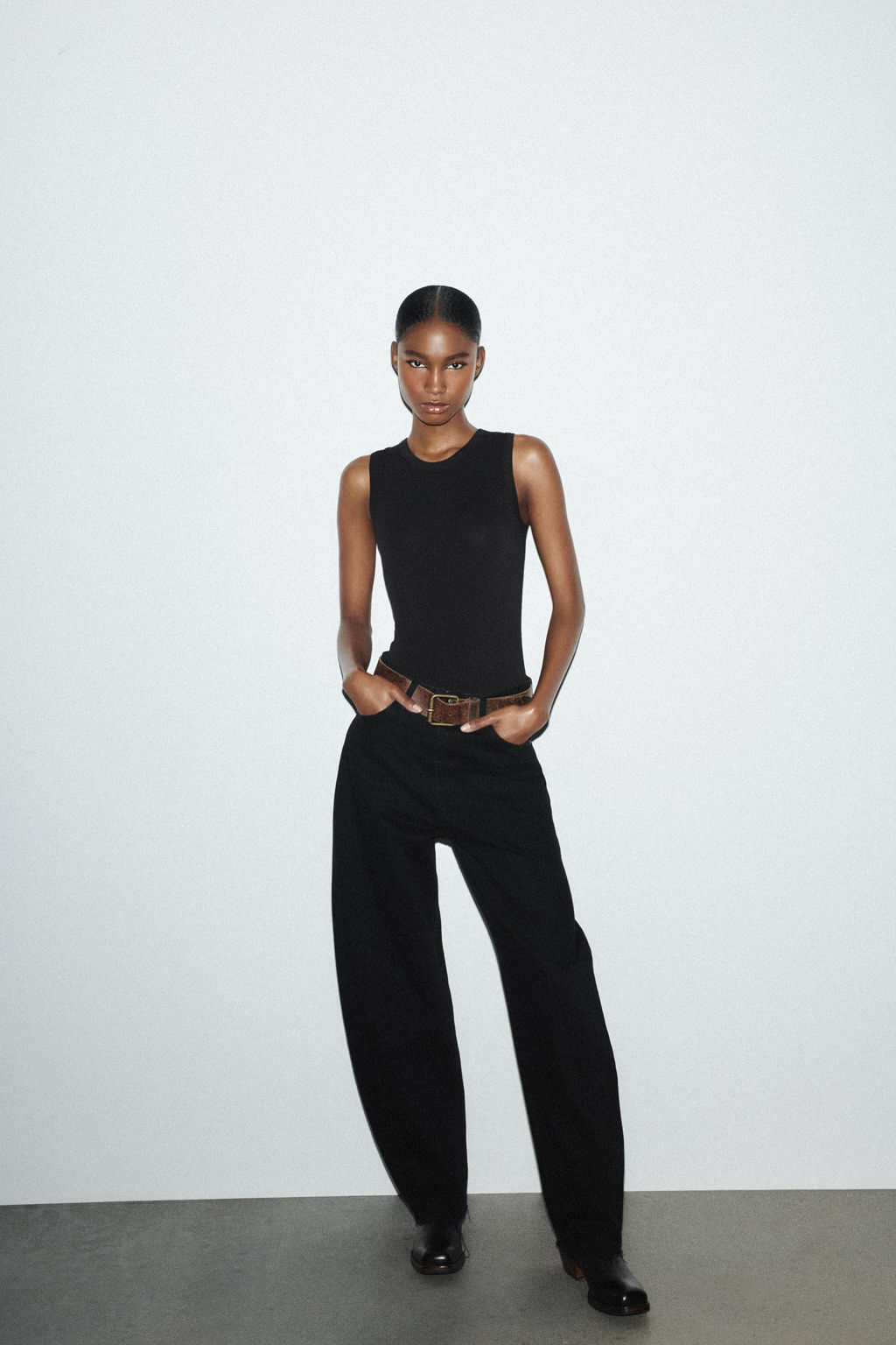 SLEEVELESS BODYSUIT