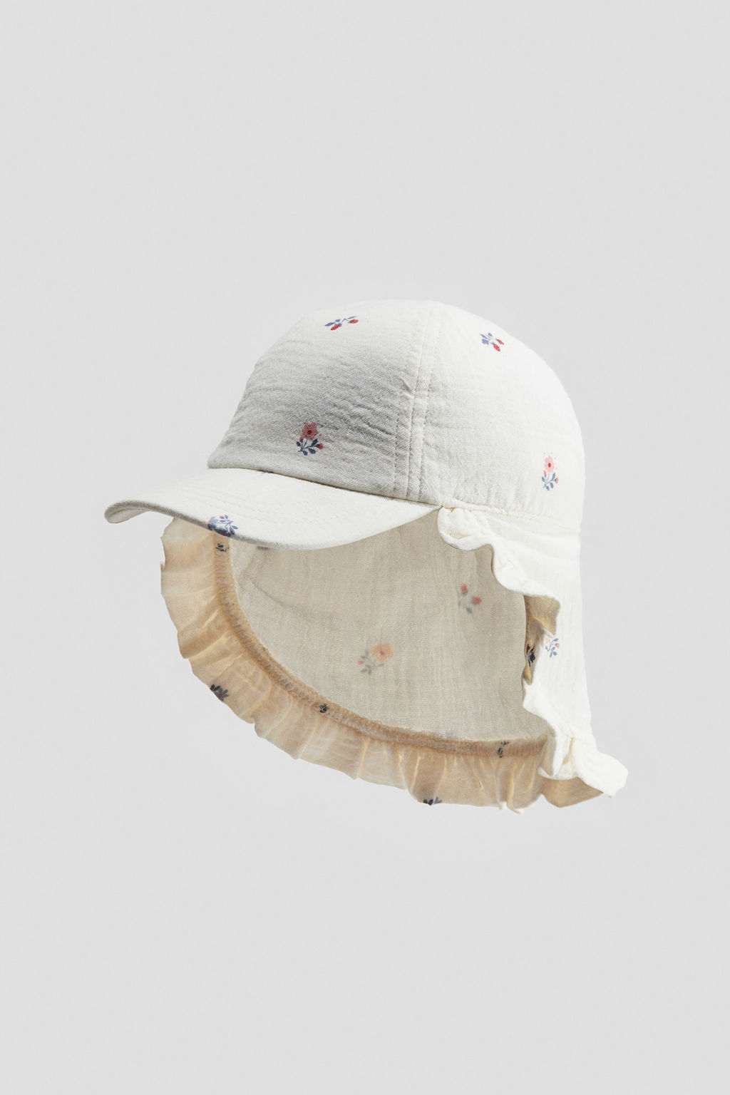 Gorra de muselina con orejas decorativas