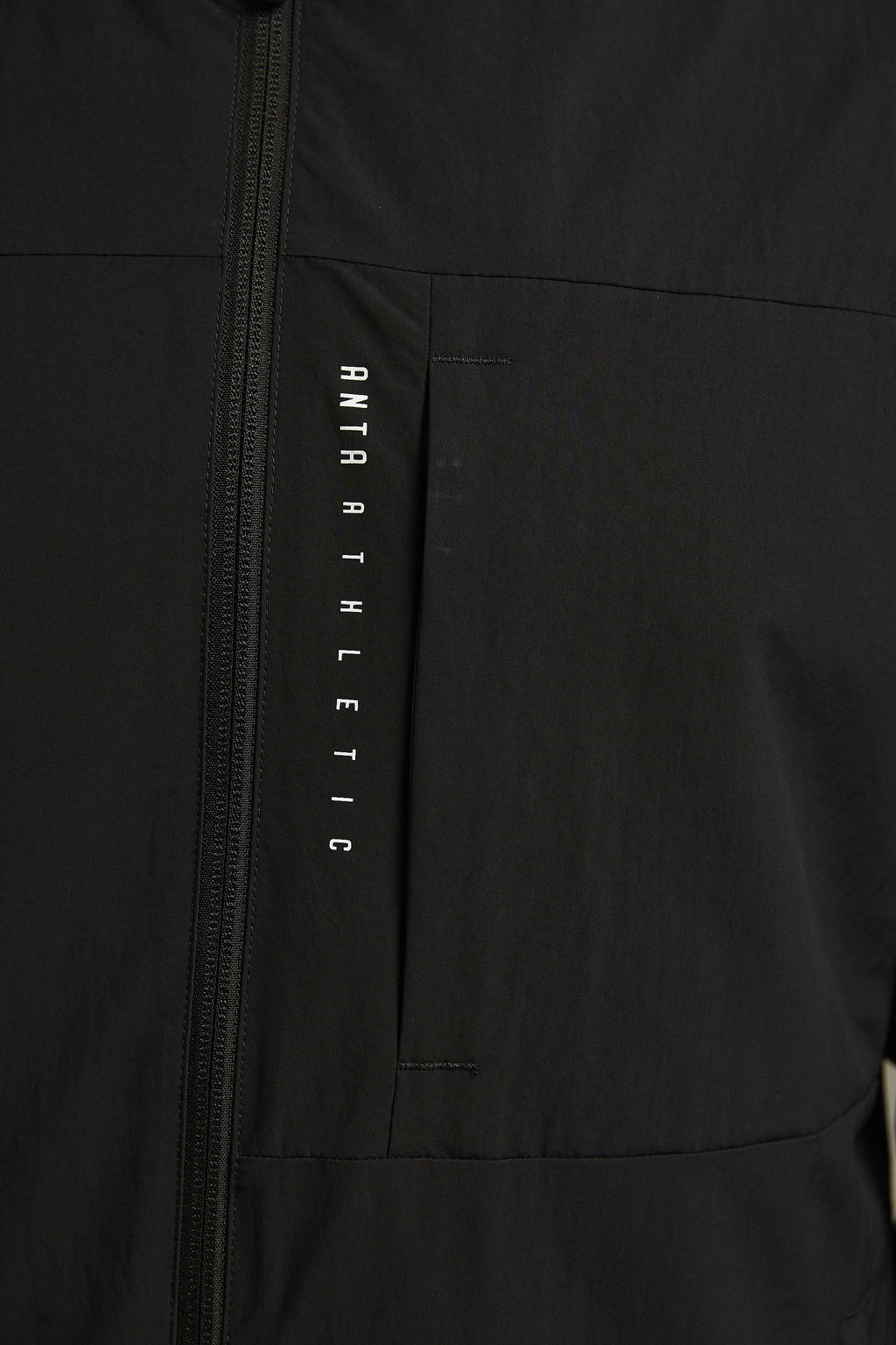 Ветровка Черный TRN ESSENTIAL Woven Track Top - Anta фото 5