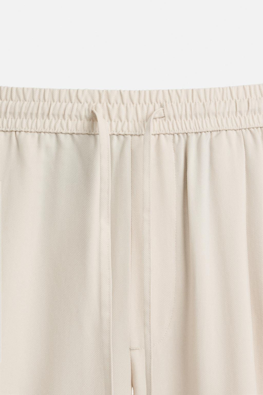 RELAXED FIT LYOCELL TROUSERS - Zara фото 29