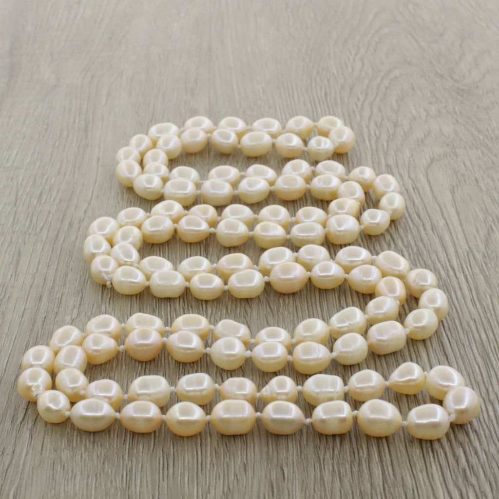 Жемчуг розовый, овальный 8х9мм, бусы длинной 116см