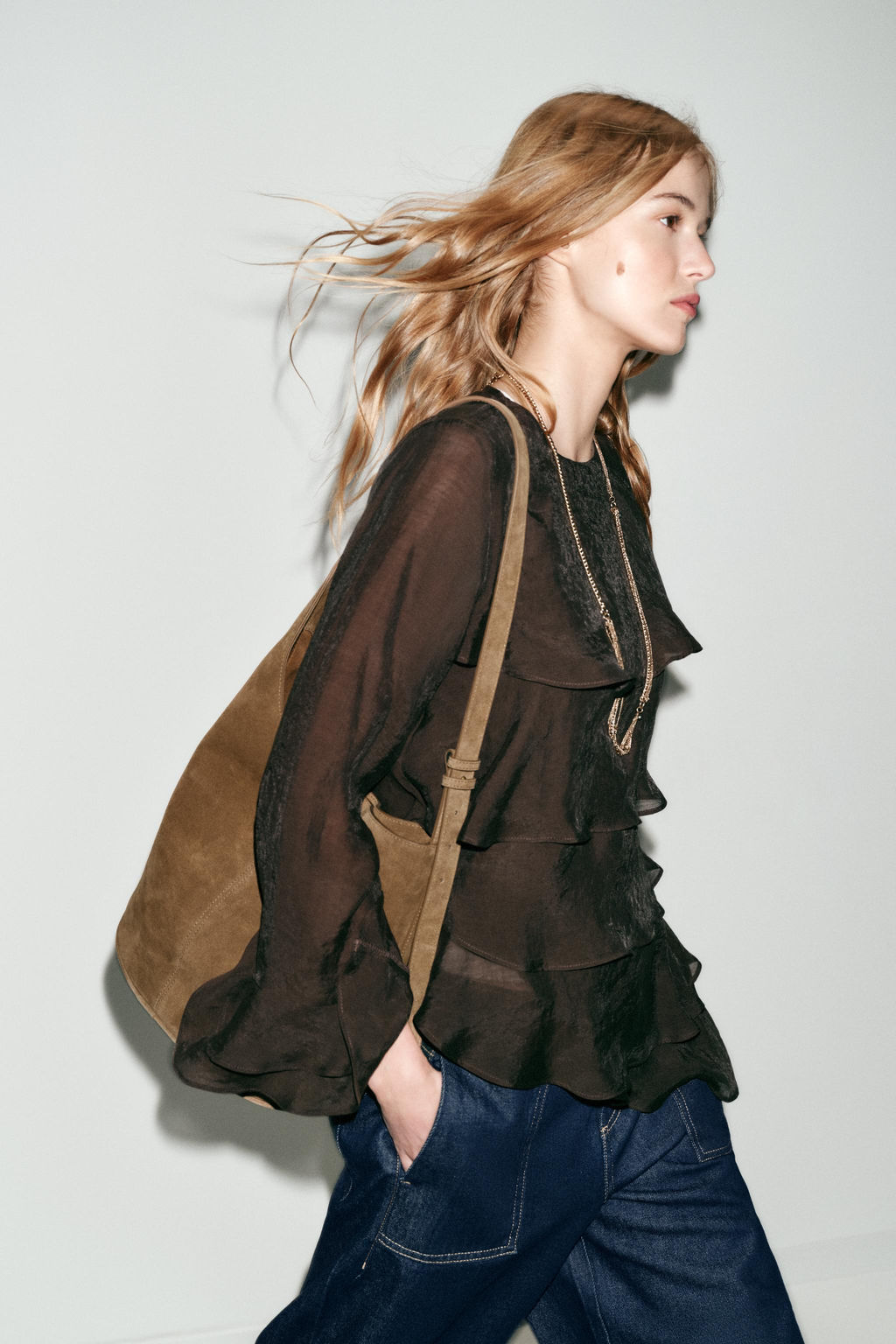 ASYMMETRIC LEATHER BUCKET BAG