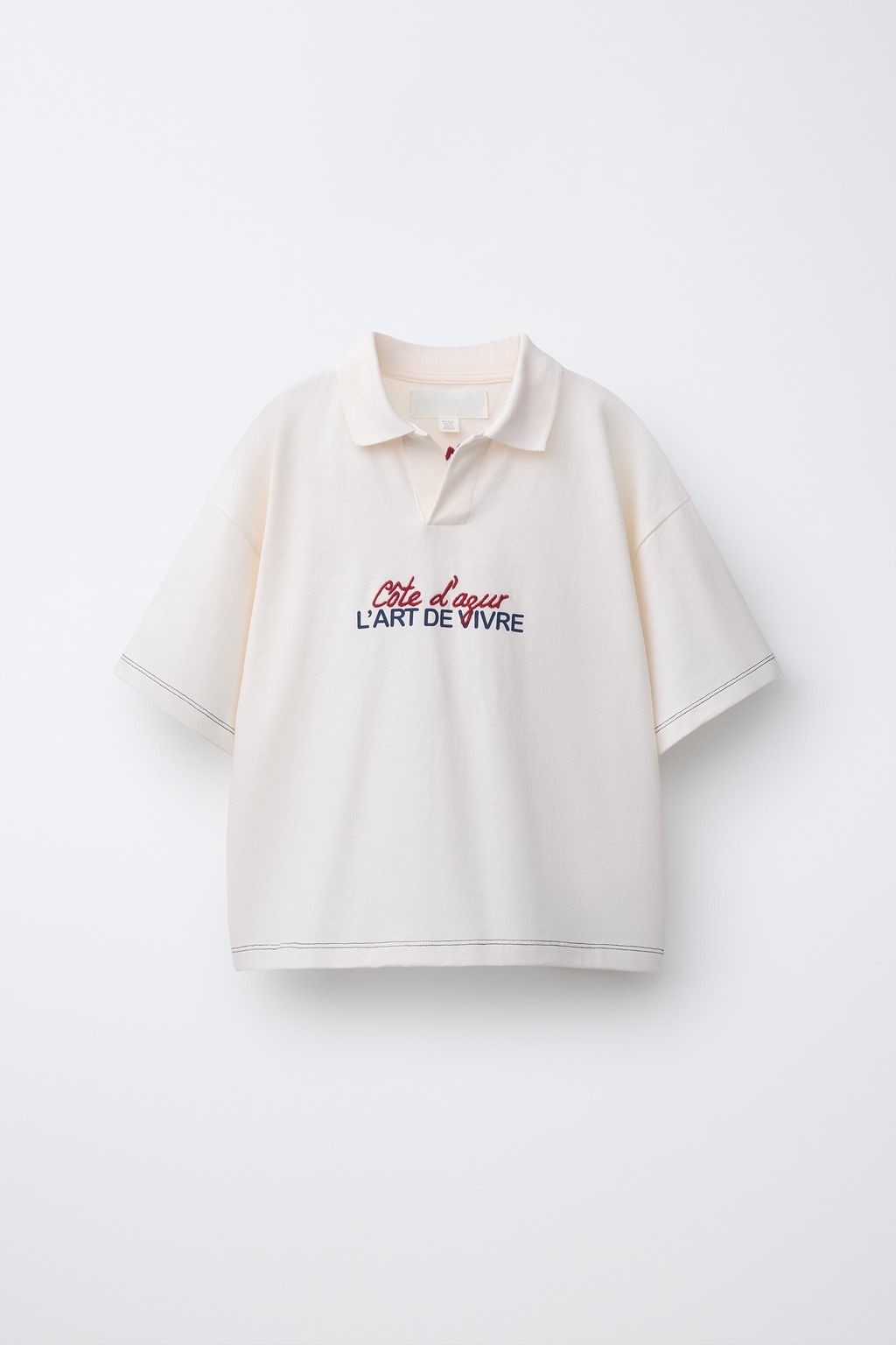POLO ESTAMPADO TEXTO / Blanco