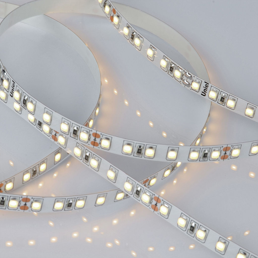 ULS-2835-120LED/m-8mm-IP20-DC24V-9,6W/m-5M-3000K Гибкая светодиодная лента на самоклеящейся основе. Катушка 5 м. в герметичной упаковке. Белый свет (3000K). ТМ Uniel.
