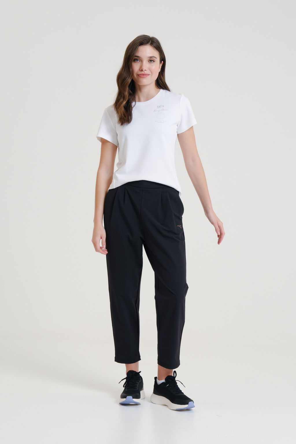 Брюки текстильные Черный TRN Woven Track Pants - Anta фото 2