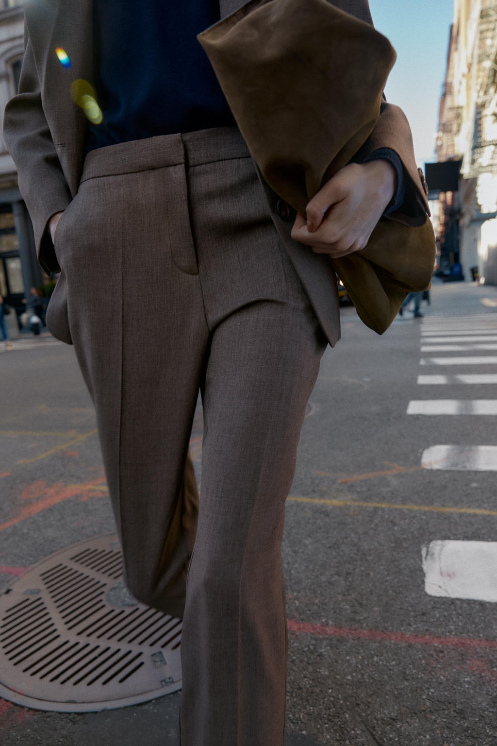 BUTTONED HEM TROUSERS
