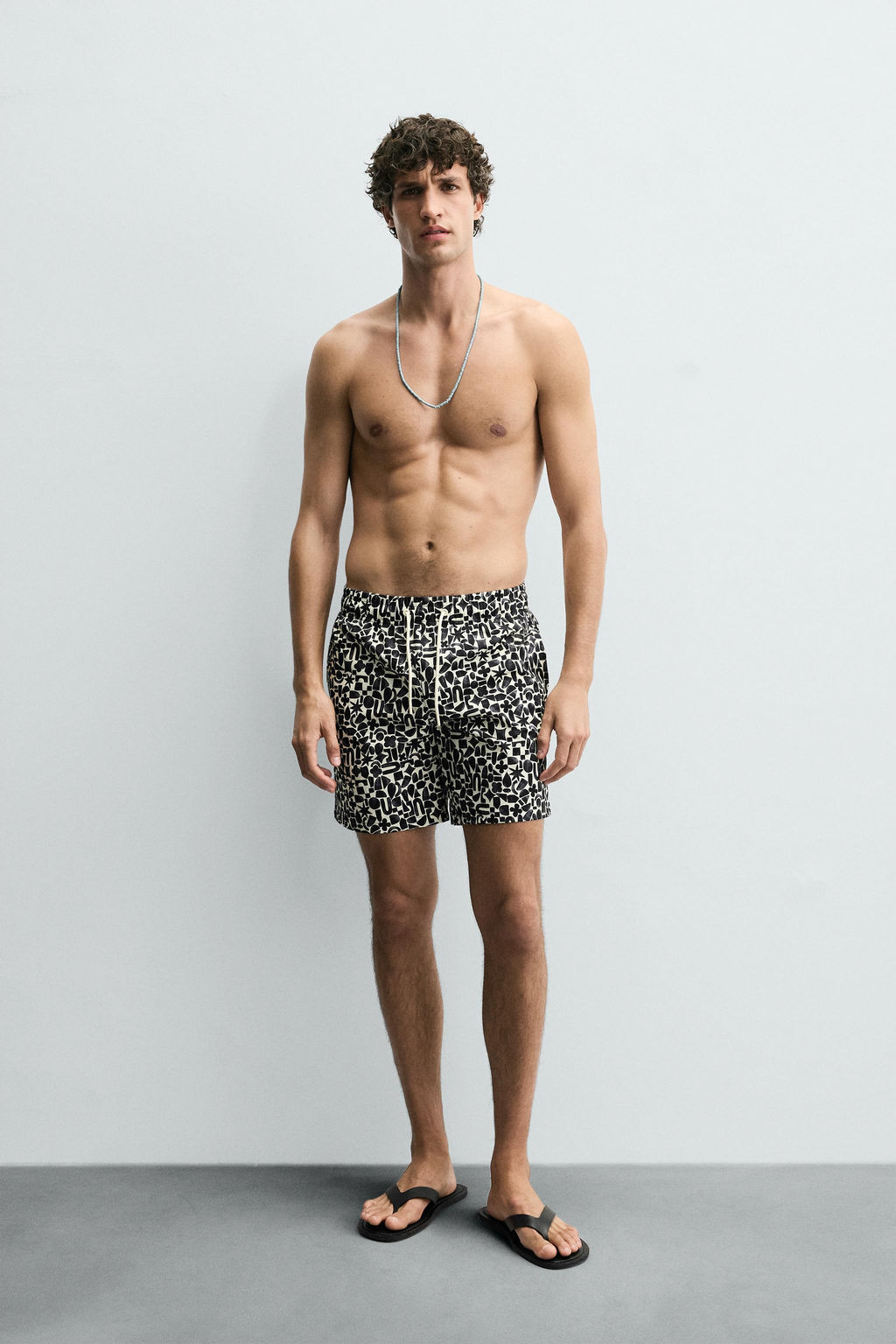 GEOMETRIC PRINT LONG SWIMMING TRUNKS