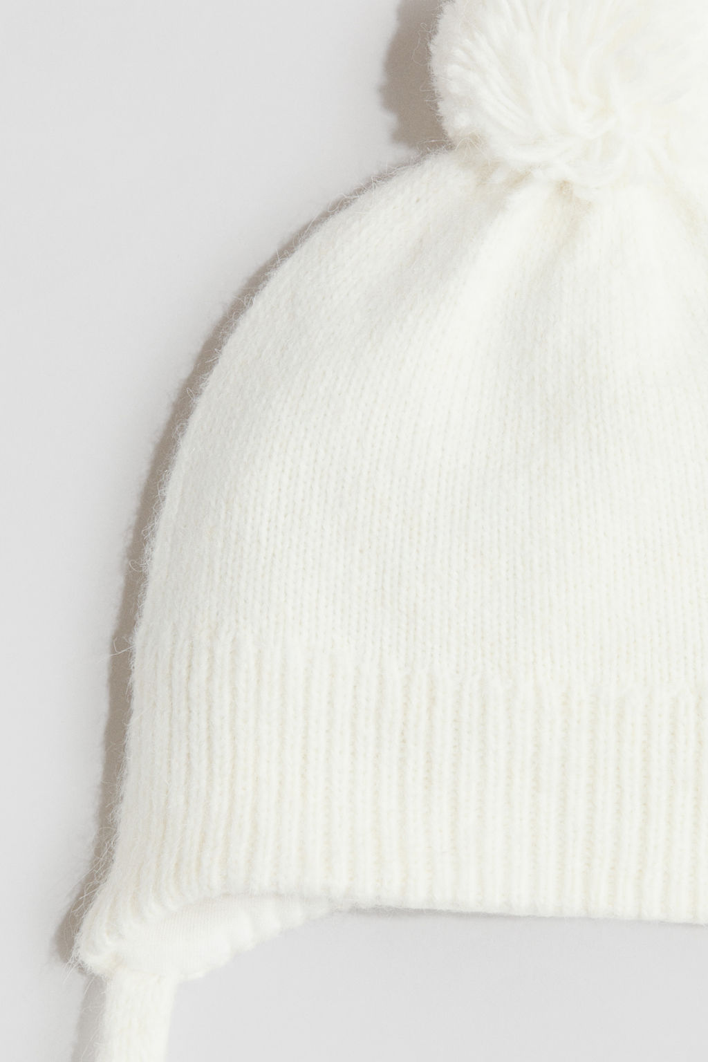 Gorro beanie con orejeras