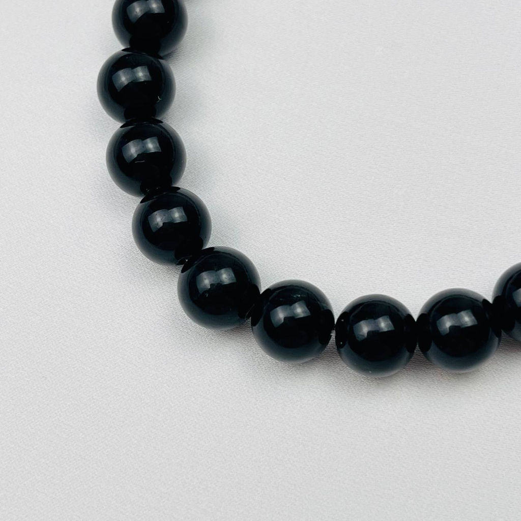 Браслет мужской из Говлита и черного Обсидиана 19 см