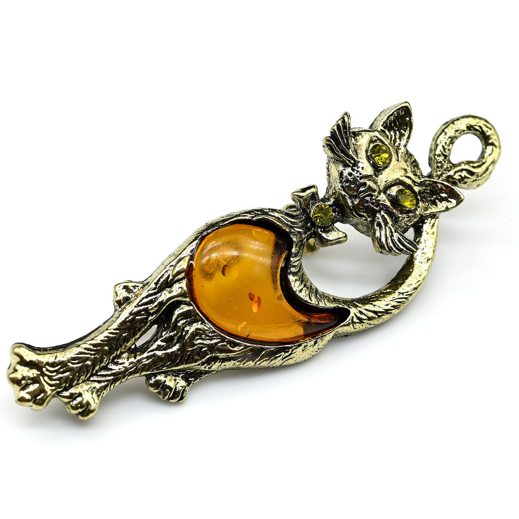 Брошь с янтарем в бронзе "Кошка" 22*61мм цв.коньячный
