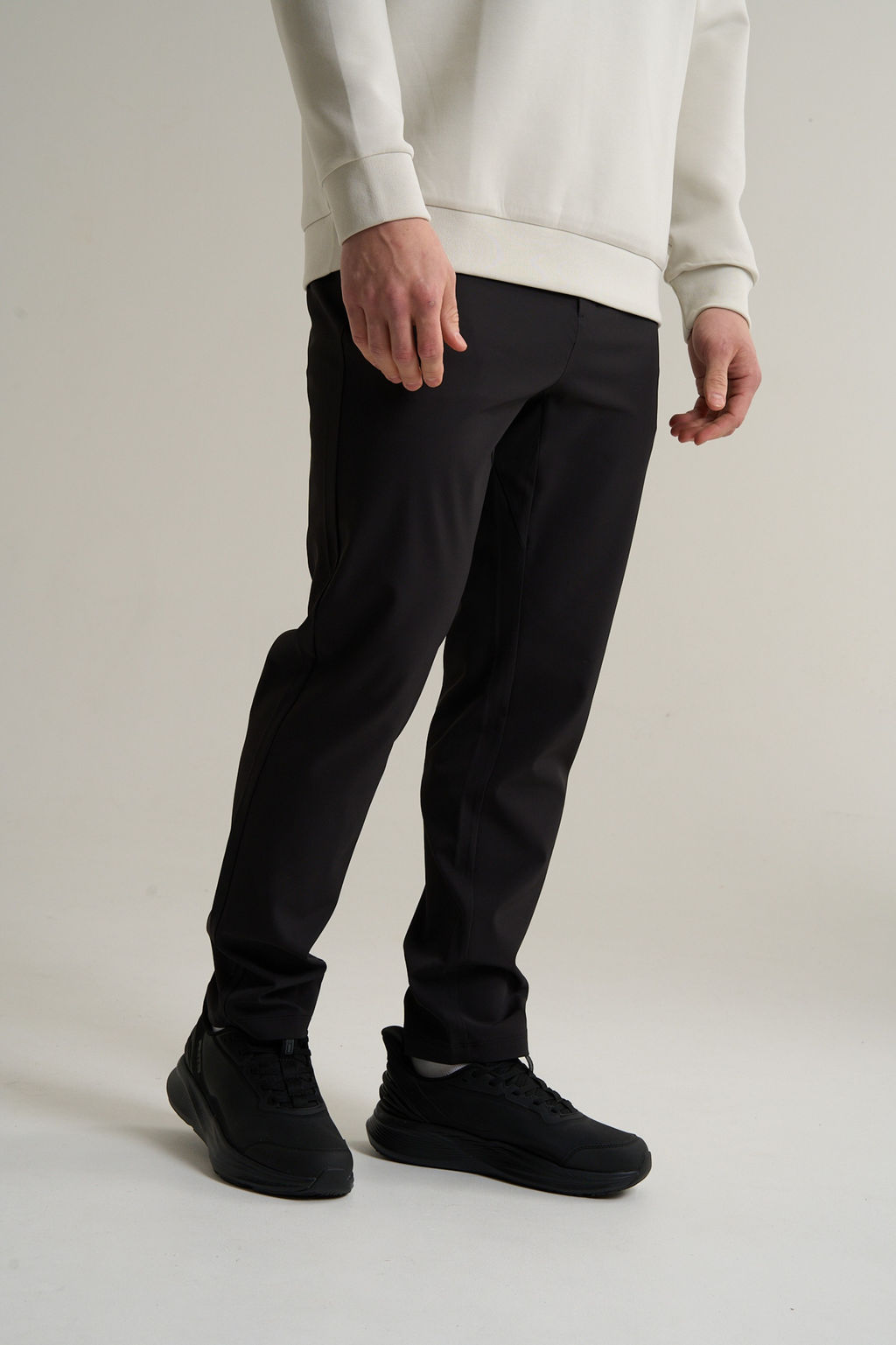 Брюки текстильные Черный TRN Woven Track Pants - Anta фото 3