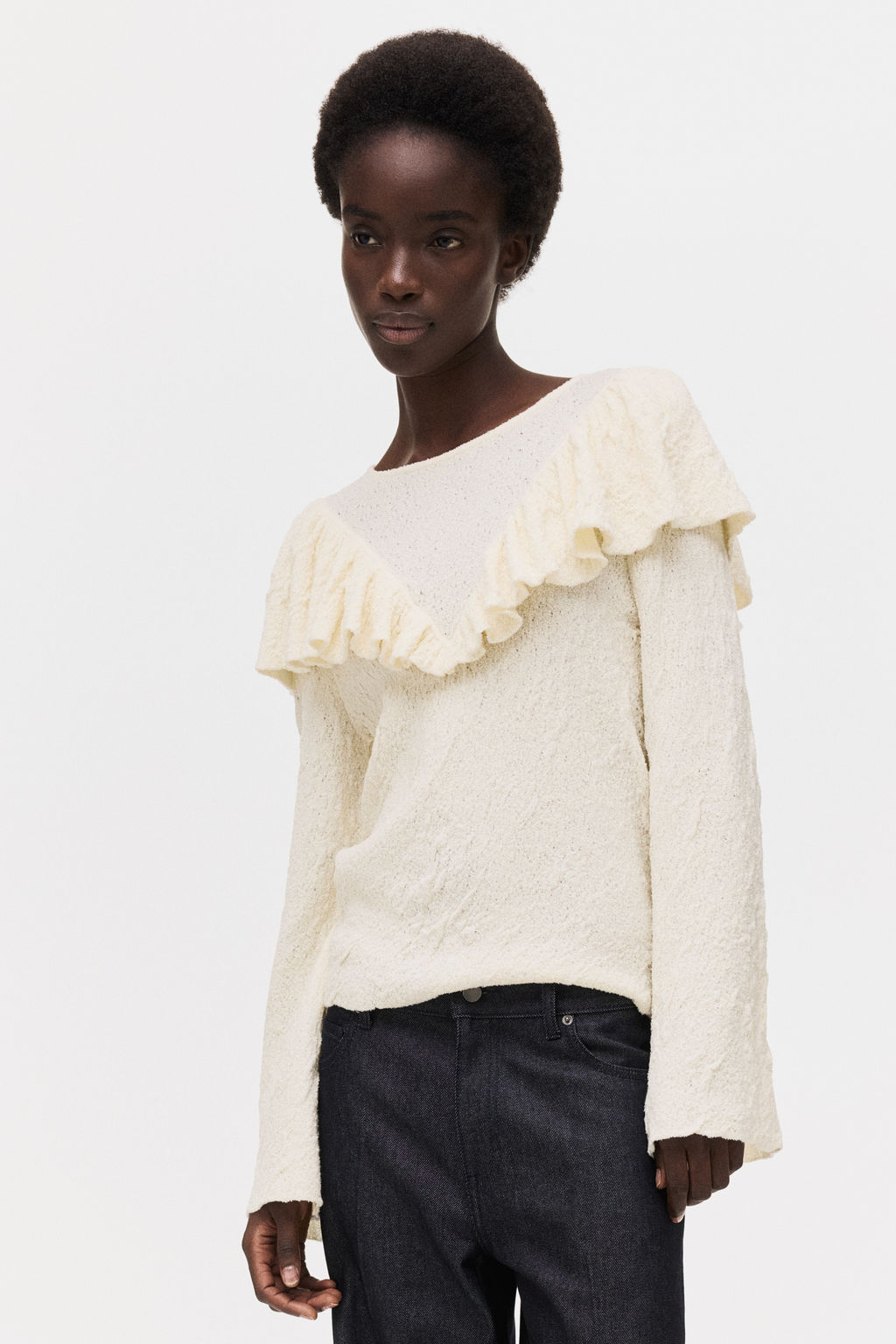 Top en punto texturizado con volantes - H&m фото 6