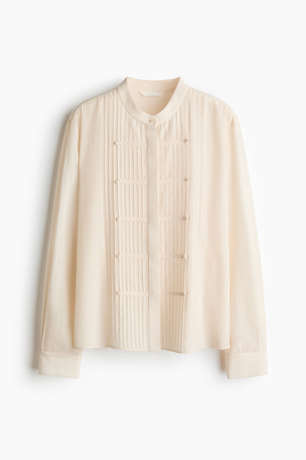 Blusa con jaretas y botonadura frontal