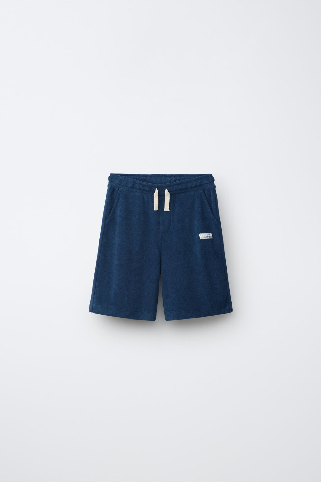 CONJUNTO POLO Y BERMUDA EFECTO TOALLA / Azul