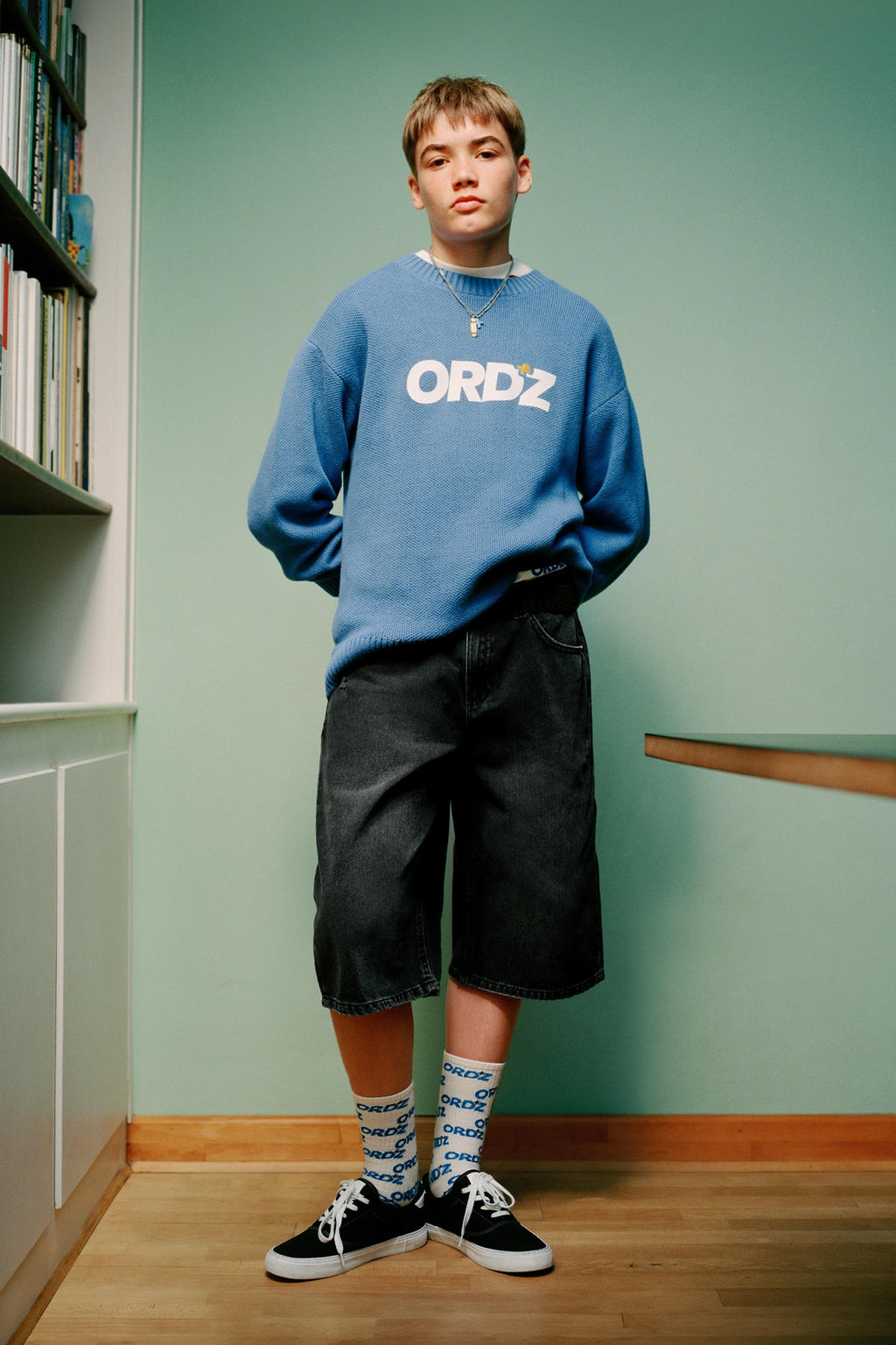 KNIT SWEATER WITH SLOGAN